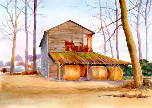 Golden Harvest of Hay Bales Under Tobacco Barn in Winter Giclée Print